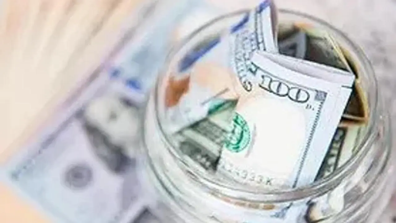 Image of a jar with money inside.