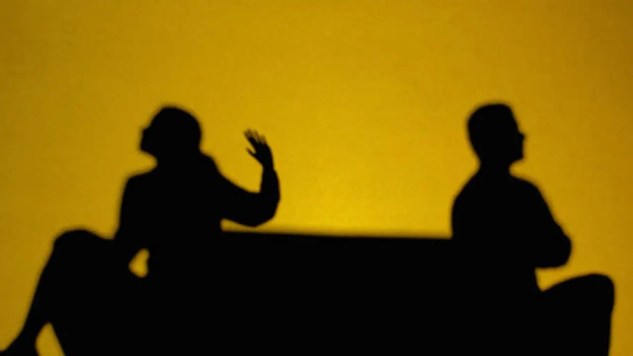 Image of two people arguing.