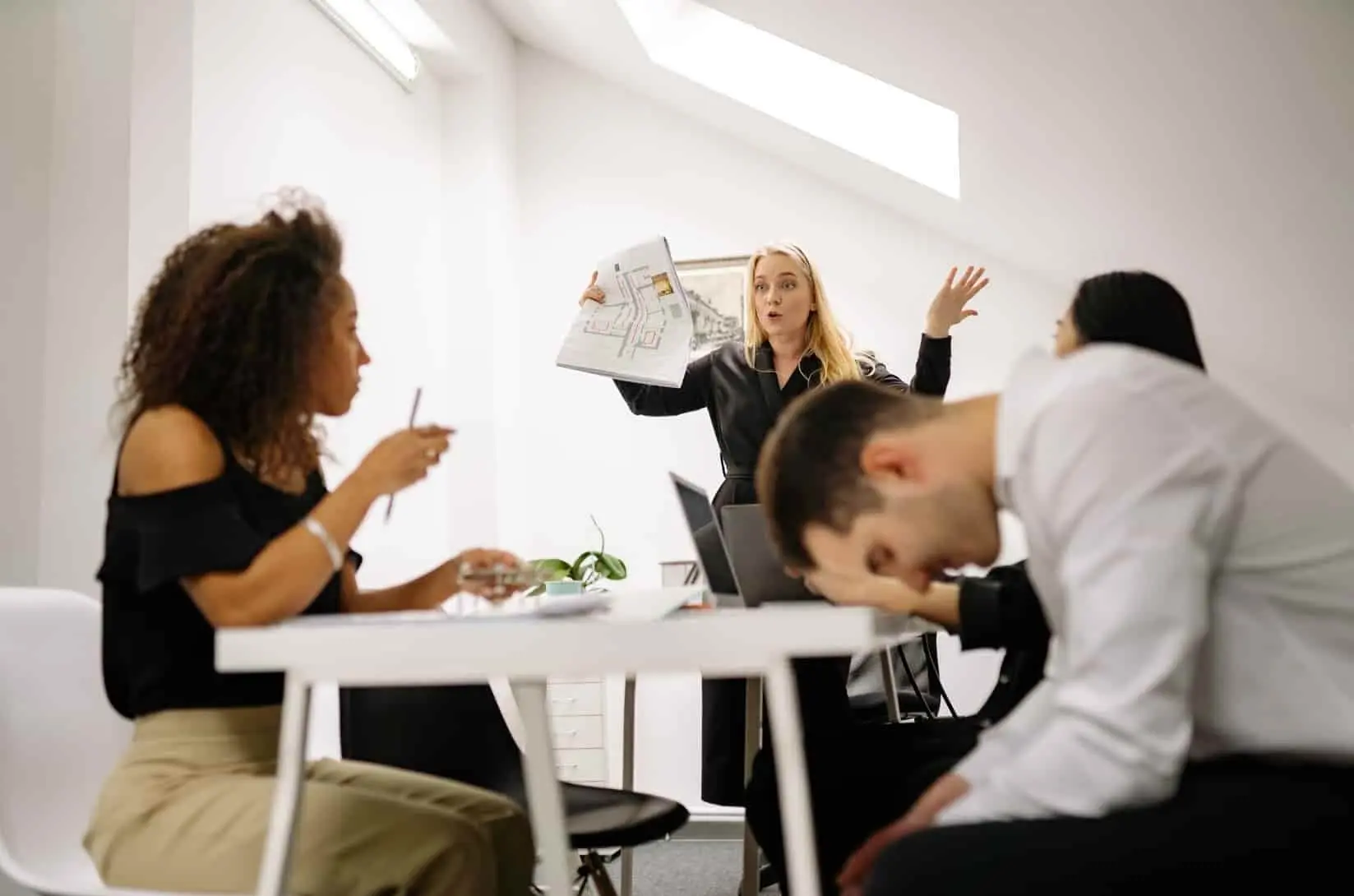 Image of a group of people discussing a topic.